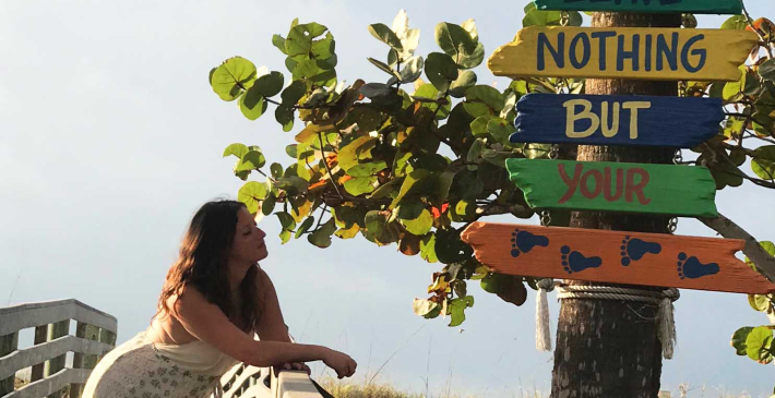 beach-sign-Travel-Marketing-Strategies.webp